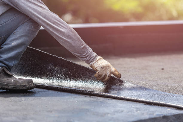 Professional Basement Waterproofing technician working in Brighton, AL